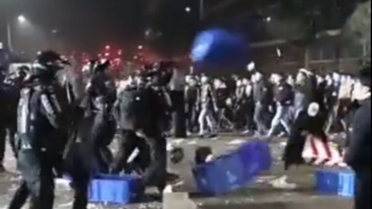 Protesters Clash with Police at Covid Test Kit Factory in China, Toss Crates at Cops in Riot Gear